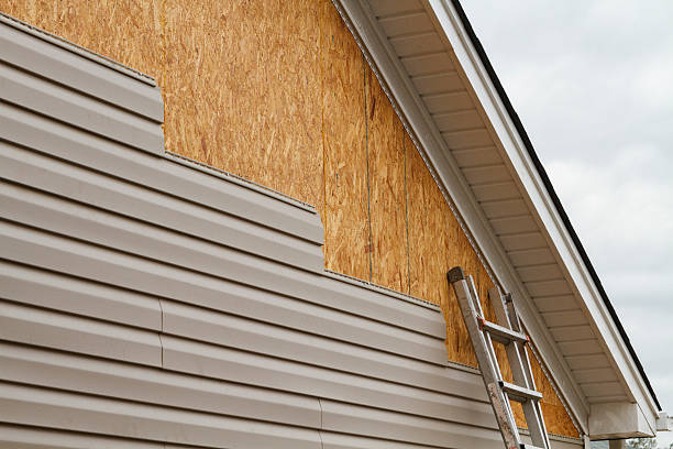 Professional Siding Installation technician working in Weirton, WV